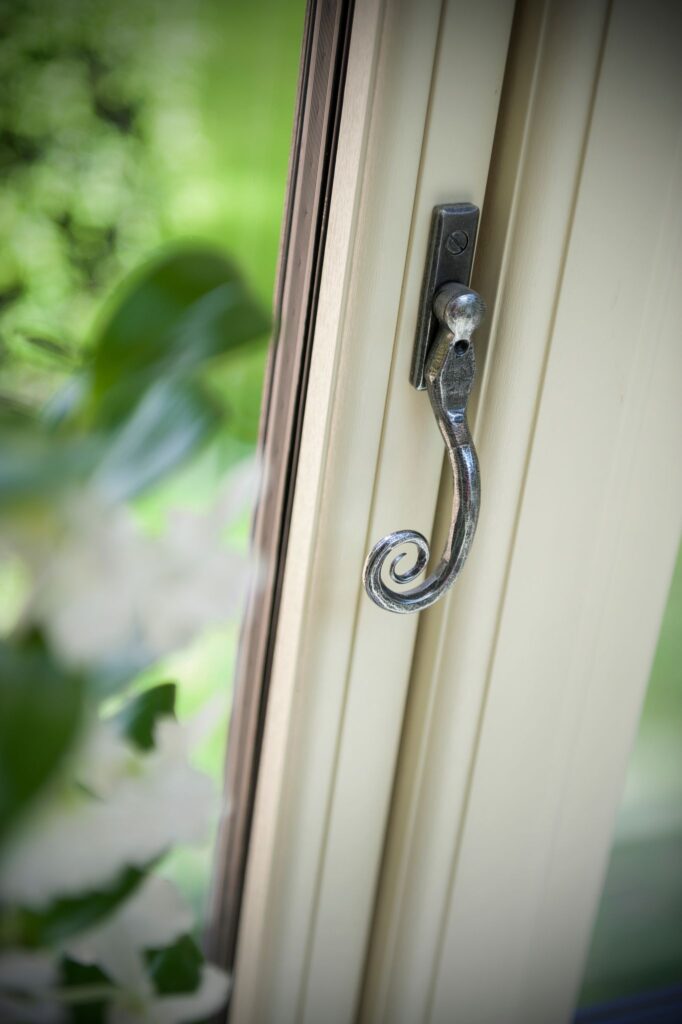 an antique looking window handle