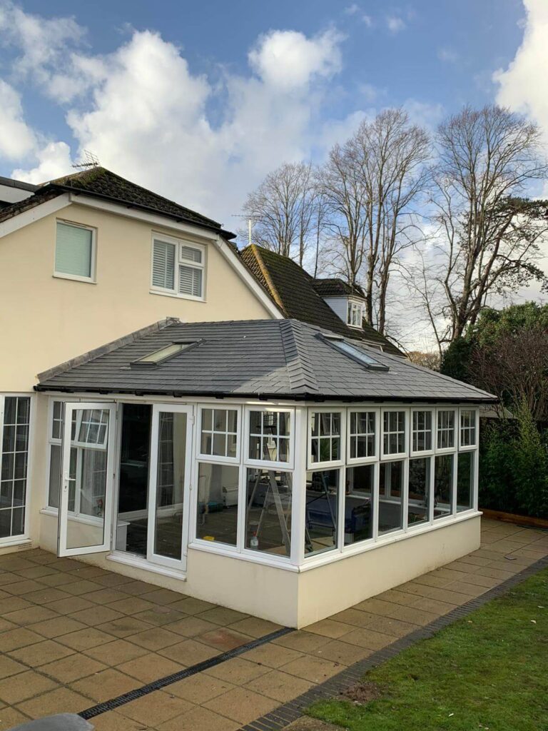 image of supalite roof showing a newly done roof with a window on the roof