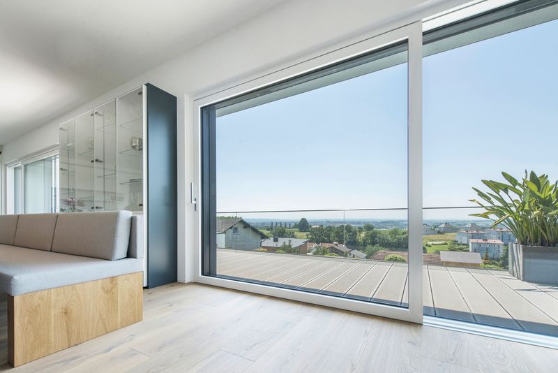 Internorm sliding glass door leading onto a balcony